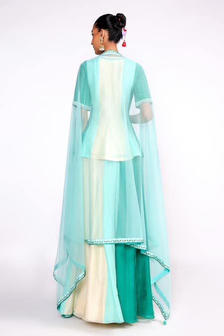 Shop_ISHA GUPTA TAYAL_Green Silk, Crepe, Net Cut Work, Sequins Color Blocked Peplum Top Skirt Set _at_Aza_Fashions