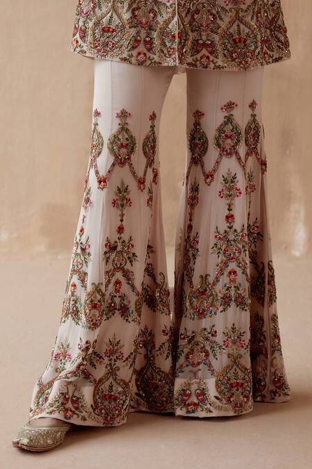 Aman Takyar Beige Georgette Zari, Sequins, Cut Thread Embroidered Peplum Kurta And Sharara Set at Aza Fashions Aman Takyar_Beige Georgette Zari, Sequins, Cut Thread Embroidered Peplum Kurta And Sharara Set _at_Aza_Fashions