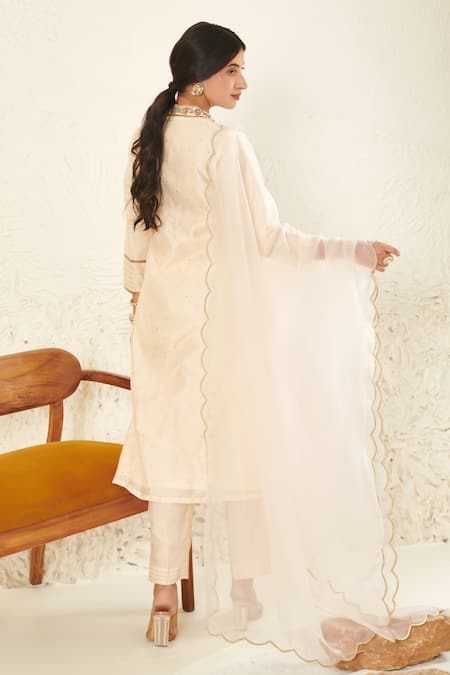 Shop Label Flamingo By Vrinda Ivory Chanderi, Organza Embroidery, Mirrors, Sequins V-neck Mukaish Kurta Set at Aza Fashions Shop_Label Flamingo By Vrinda_Ivory Chanderi, Organza Embroidery, Mirrors, Sequins V-neck Mukaish Kurta Set _at_Aza_Fashions