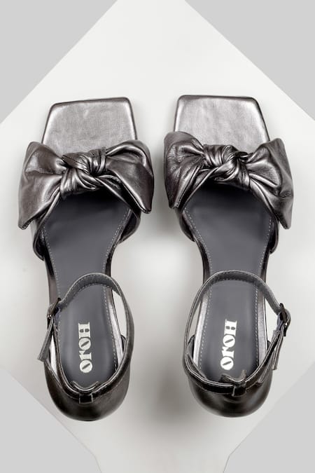 Shop Oroh Silver Manises Leather Front Knotted Heels at Aza Fashions Shop_Oroh_Silver Manises Leather Front Knotted Heels _at_Aza_Fashions