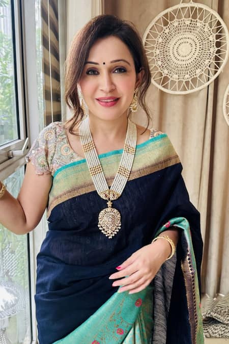 Anchor Syamala in bridal diamond emerald jewellery set