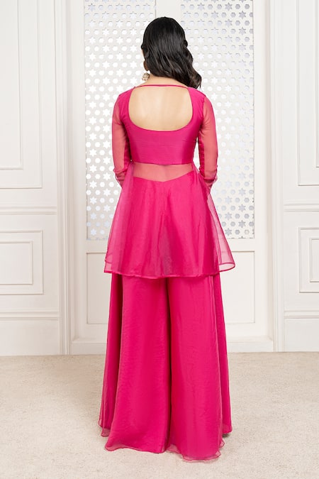 Shop The Aarya Pink Chanderi, Viscose Embroidery, Sequins, Glitter Hand Peplum Top Gharara Set at Aza Fashions Shop_The Aarya_Pink Chanderi, Viscose Embroidery, Sequins, Glitter Hand Peplum Top Gharara Set _at_Aza_Fashions