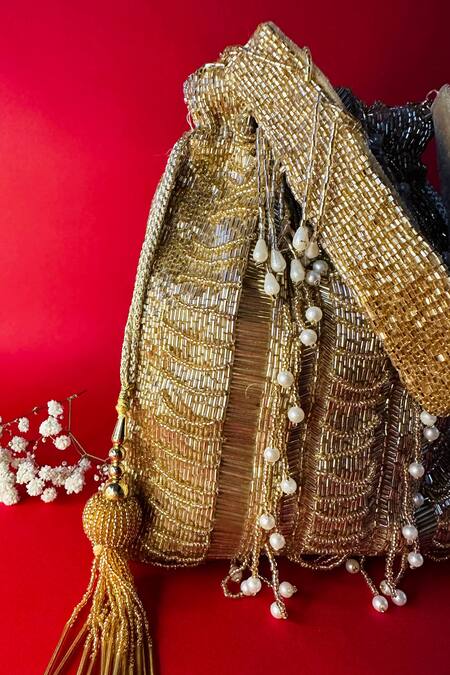 Nayaab By Sonia_Gold Cut Work, Pearls Briller Sac Twin Embellished Potli_Online_at_Aza_Fashions