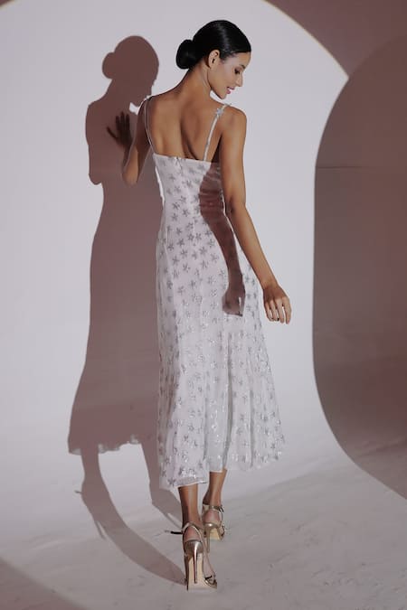 Shop Amrta By Guneet Kondal White Viscose Sequins Sweetheart Neck Starry Embellished Slit Maxi Dress at Aza Fashions Shop_Amrta By Guneet Kondal_White Viscose Sequins Sweetheart Neck Starry Embellished Slit Maxi Dress _at_Aza_Fashions