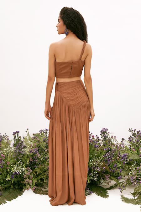 Shop Amrta By Guneet Kondal Brown Chiffon Asymmetric Ruched Cut Out Top And Skirt Set at Aza Fashions Shop_Amrta By Guneet Kondal_Brown Chiffon Asymmetric Ruched Cut Out Top And Skirt Set _at_Aza_Fashions