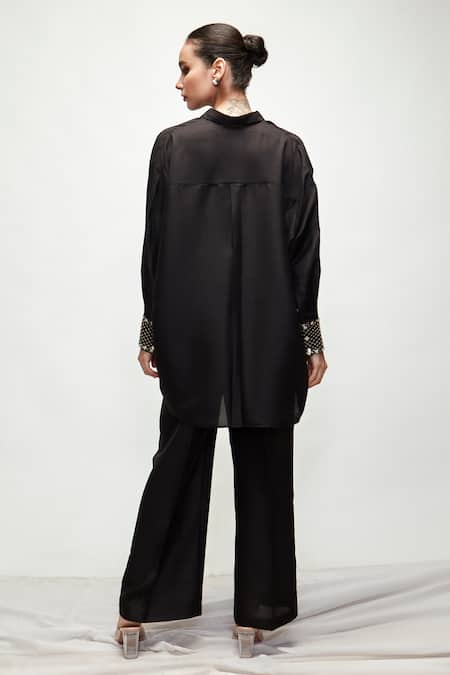 Shop Ranian Black Silk Pearls Shawl Neck Button Down Asymmetric Shirt And Pant Set at Aza Fashions Shop_Ranian_Black Silk Pearls Shawl Neck Button Down Asymmetric Shirt And Pant Set _at_Aza_Fashions