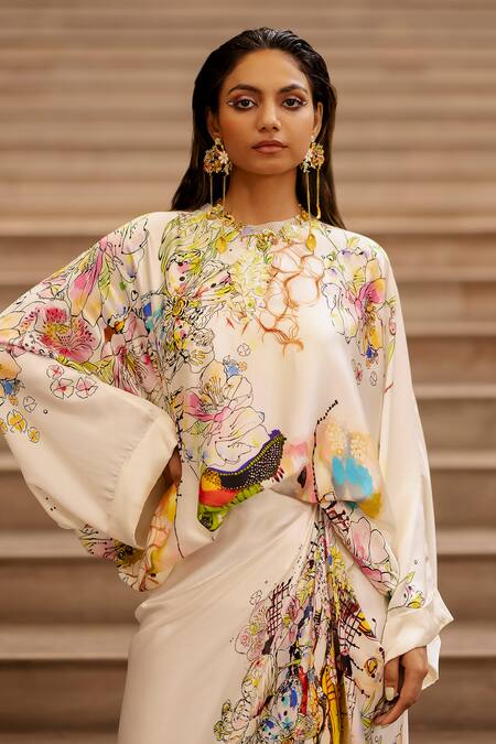 AK-OK Cream Silk Embroidery Boat Neck Flowy Top Asymmetric Skirt Set at Aza Fashions AK-OK_Cream Silk Embroidery Boat Neck Flowy Top Asymmetric Skirt Set _at_Aza_Fashions