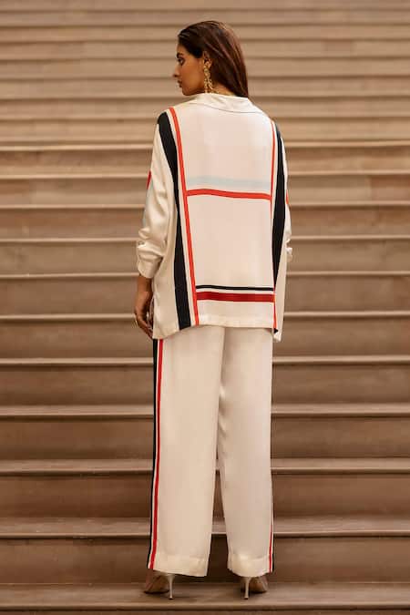 Shop AK-OK Cream Silk Shawl Neck Striped Shirt And Pant Set at Aza Fashions Shop_AK-OK_Cream Silk Shawl Neck Striped Shirt And Pant Set _at_Aza_Fashions