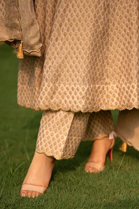 Safaa_Ivory Velour, Velvet Cut Work, Tassels, Zari Azara Floral Woven Anarkali Set _at_Aza_Fashions