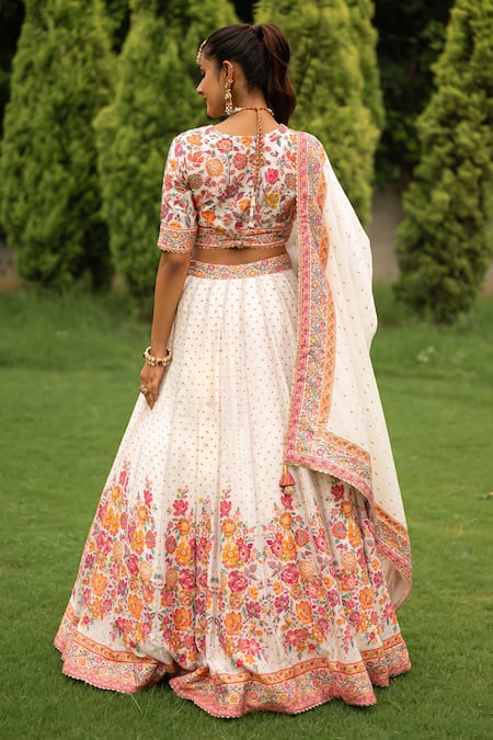 Shop Safaa White Velvet Embroidery, Lace V-neck Gulaabdaar Floral Pattern Woven Lehenga Set at Aza Fashions Shop_Safaa_White Velvet Embroidery, Lace V-neck Gulaabdaar Floral Pattern Woven Lehenga Set _at_Aza_Fashions