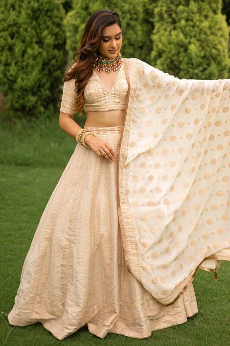 Shop Safaa White Velvet, Silk Lace, Zari V-neck Parisa Stripe Pattern Woven Lehenga Set Online at Aza Fashions Shop_Safaa_White Velvet, Silk Lace, Zari V-neck Parisa Stripe Pattern Woven Lehenga Set _Online_at_Aza_Fashions