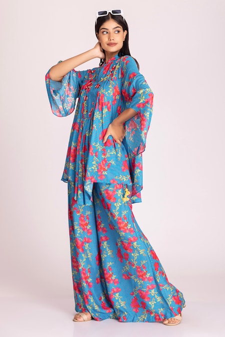 Tanu Malhotra Blue Cotton, Silk Sequins, Beads Open Floral Print Asymmetric Top And Pant Set at Aza Fashions Tanu Malhotra_Blue Cotton, Silk Sequins, Beads Open Floral Print Asymmetric Top And Pant Set_at_Aza_Fashions