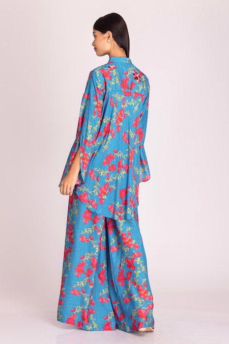 Shop Tanu Malhotra Blue Cotton, Silk Sequins, Beads Open Floral Print Asymmetric Top And Pant Set at Aza Fashions Shop_Tanu Malhotra_Blue Cotton, Silk Sequins, Beads Open Floral Print Asymmetric Top And Pant Set_at_Aza_Fashions