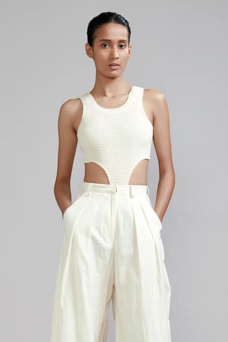 MATI_1_Off White Cotton Round Neck Smocked Bodysuit And Trouser Set _Online_at_Aza_Fashions