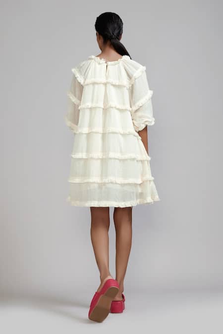 Shop MATI_1 Off White Cotton Round Neck Tiered Fringe Dress at Aza Fashions Shop_MATI_1_Off White Cotton Round Neck Tiered Fringe Dress _at_Aza_Fashions