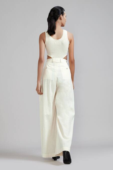 Shop MATI Off White Cotton Long Pleated Trouser at Aza Fashions Shop_MATI_Off White Cotton Long Pleated Trouser_at_Aza_Fashions