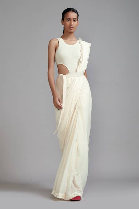 Buy MATI_1 Off White Cotton Round Neck Frill Border Saree With Smocked Bodysuit Online at Aza Fashions Buy_MATI_1_Off White Cotton Round Neck Frill Border Saree With Smocked Bodysuit _Online_at_Aza_Fashions