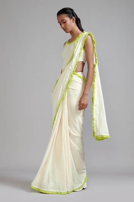 Buy MATI_1 Off White Smocked Bodysuit And Saree Set Online at Aza Fashions Buy_MATI_1_Off White Smocked Bodysuit And Saree Set _Online_at_Aza_Fashions
