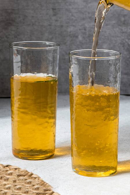 Shop The Table Fable White Glass Handmade Hammered Pitcher And Tumbler Set at Aza Fashions Shop_The Table Fable_White Glass Handmade Hammered Pitcher And Tumbler Set_at_Aza_Fashions