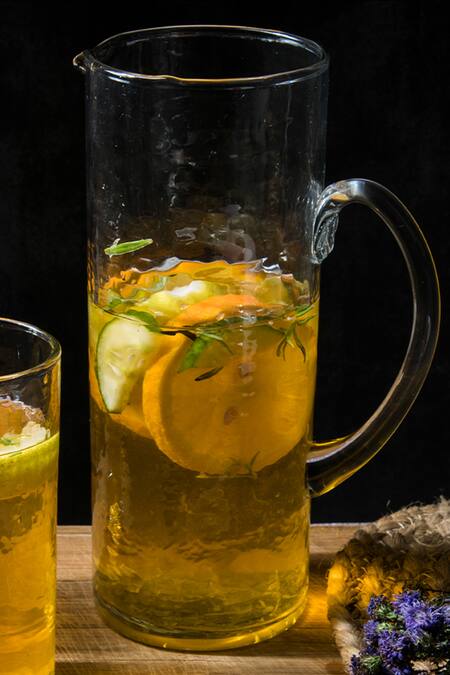 The Table Fable White Glass Handmade Hammered Pitcher And Tumbler Set at Aza Fashions The Table Fable_White Glass Handmade Hammered Pitcher And Tumbler Set_at_Aza_Fashions