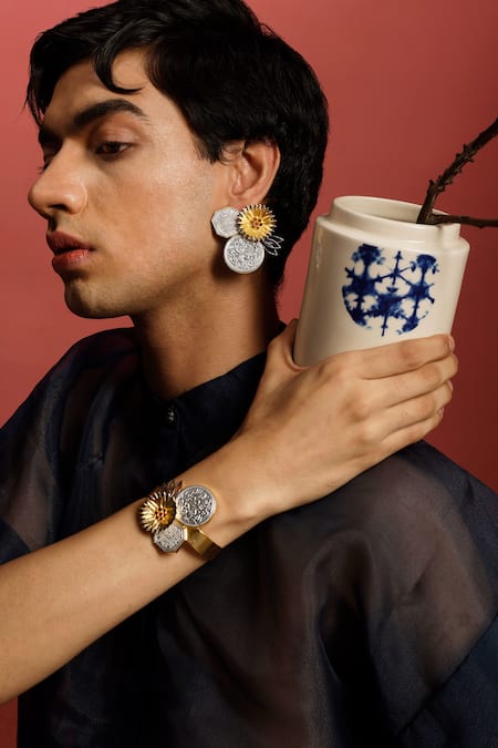 Trupti Mohta_Silver Plated Floral Shaped Mudra Carved Earrings _Online_at_Aza_Fashions