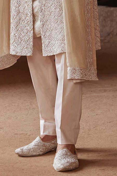 Buy Nitika Gujral Beige Silk, Cotton, Mohair Resham And Thread Embroidered Sherwani Trouser Set Online at Aza Fashions Buy_Nitika Gujral_Beige Silk, Cotton, Mohair Resham And Thread Embroidered Sherwani Trouser Set _Online_at_Aza_Fashions