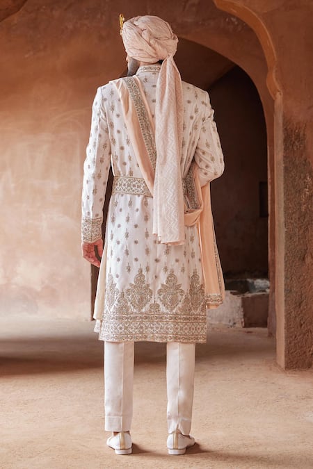 Shop Nitika Gujral Pink Sherwani Tafetta Silk Embroidery French Knots Dabka Trouser Set at Aza Fashions Shop_Nitika Gujral_Pink Sherwani Tafetta Silk Embroidery French Knots Dabka Trouser Set _at_Aza_Fashions