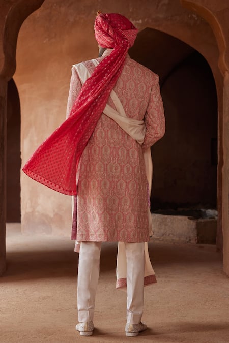 Shop Nitika Gujral Peach Mohair, Silk, Cotton, Lycra Embroidery, Beads Resham Sherwani Trouser Set at Aza Fashions Shop_Nitika Gujral_Peach Mohair, Silk, Cotton, Lycra Embroidery, Beads Resham Sherwani Trouser Set _at_Aza_Fashions