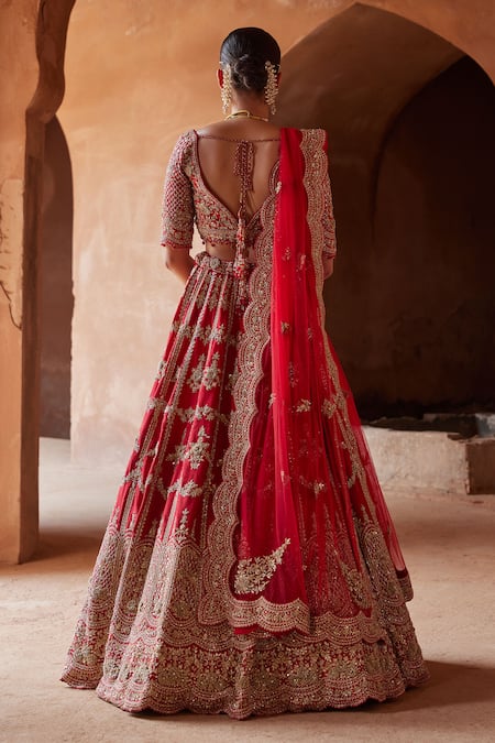 Shop Nitika Gujral Red Silk, Net Crystals, Beads, Embroidery Raw Bridal Lehenga Set at Aza Fashions Shop_Nitika Gujral_Red Silk, Net Crystals, Beads, Embroidery Raw Bridal Lehenga Set _at_Aza_Fashions