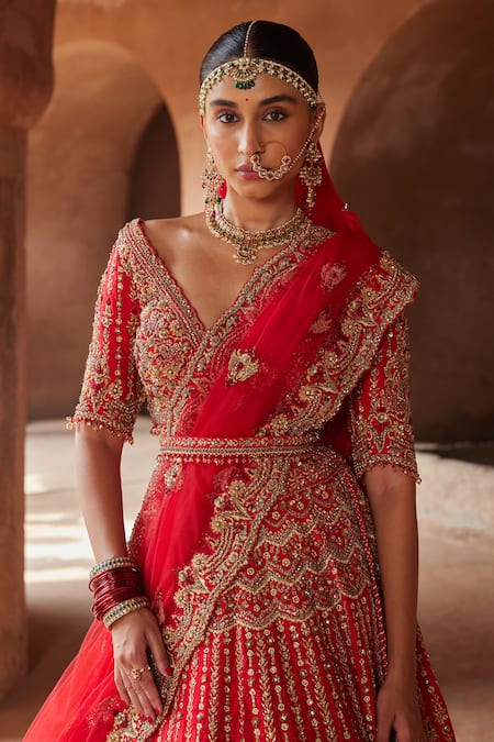 New traditional red color satin silk bridal lehenga with a price.