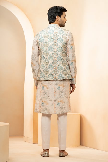 Studio Bagechaa Ivory Chanderi, Silk Sequins, Embroidery Floral Print Bundi Kurta Set at Aza Fashions Studio Bagechaa_Ivory Chanderi, Silk Sequins, Embroidery Floral Print Bundi Kurta Set _at_Aza_Fashions