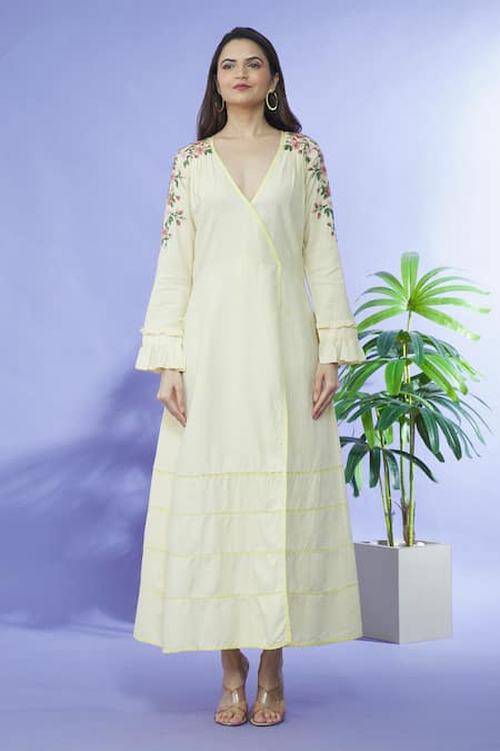 Shruti Sancheti_Yellow Cotton Embroidery V-neck Overlap Dress With Belt _at_Aza_Fashions