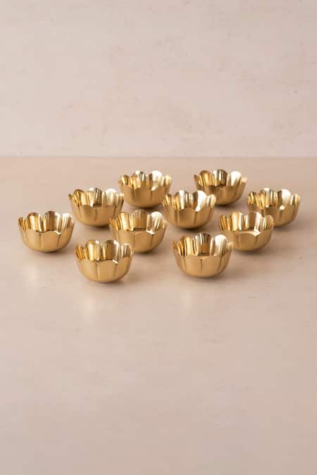 Shop_The Decor Remedy_Gold Brass Alloy Festive Tiny Urli Tea Light Floaters Set Of 10_Online_at_Aza_Fashions