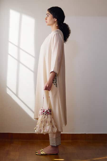 Dot Ivory Cotton, Silk Embroidery Round Neck Gia Pocket Kurta And Pant Set at Aza Fashions Dot_Ivory Cotton, Silk Embroidery Round Neck Gia Pocket Kurta And Pant Set _at_Aza_Fashions