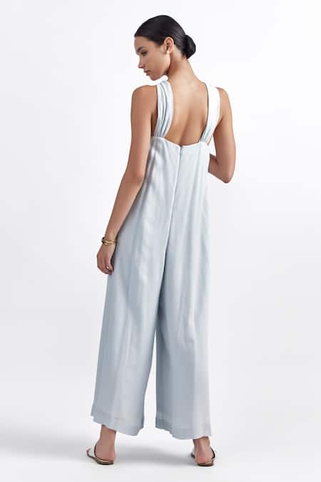 Shop Perona Blue Viscose, Linen Halter Neck Twisted Jumpsuit at Aza Fashions Shop_Perona_Blue Viscose, Linen Halter Neck Twisted Jumpsuit _at_Aza_Fashions