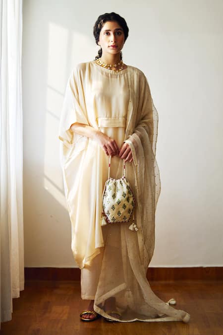 Shop Dot Ivory Cotton, Silk Round Neck Oleria Solid Kurta And Pant Set at Aza Fashions Shop_Dot_Ivory Cotton, Silk Round Neck Oleria Solid Kurta And Pant Set _at_Aza_Fashions