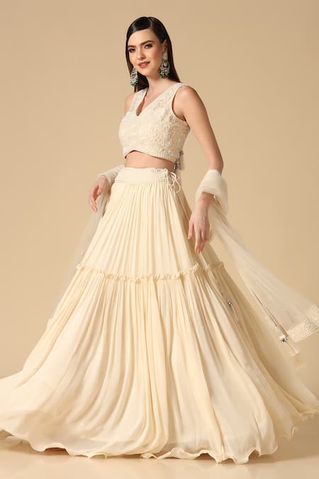 Shop_Two Sisters By Gyans_White Net, Georgette Pearls V-neck Pleated Lehenga Set With Embroidered Blouse _Online_at_Aza_Fashions