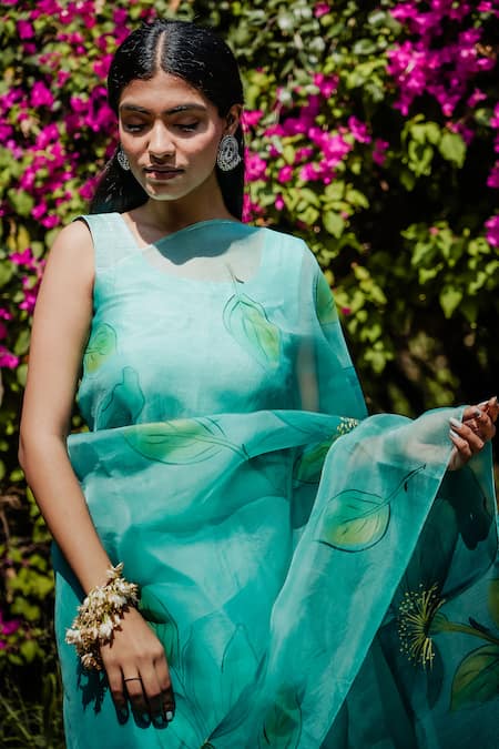 Mangalmay By Aastha Blue Saree Pure Silk Organza Hand Painted Floral With Unstitched Blouse Piece Online at Aza Fashions Mangalmay By Aastha_Blue Saree Pure Silk Organza Hand Painted Floral With Unstitched Blouse Piece _Online_at_Aza_Fashions