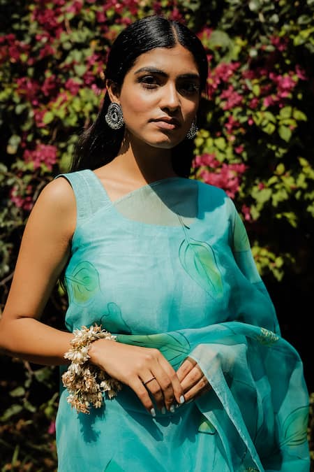 Shop Mangalmay By Aastha Blue Saree Pure Silk Organza Hand Painted Floral With Unstitched Blouse Piece Online at Aza Fashions Shop_Mangalmay By Aastha_Blue Saree Pure Silk Organza Hand Painted Floral With Unstitched Blouse Piece _Online_at_Aza_Fashions