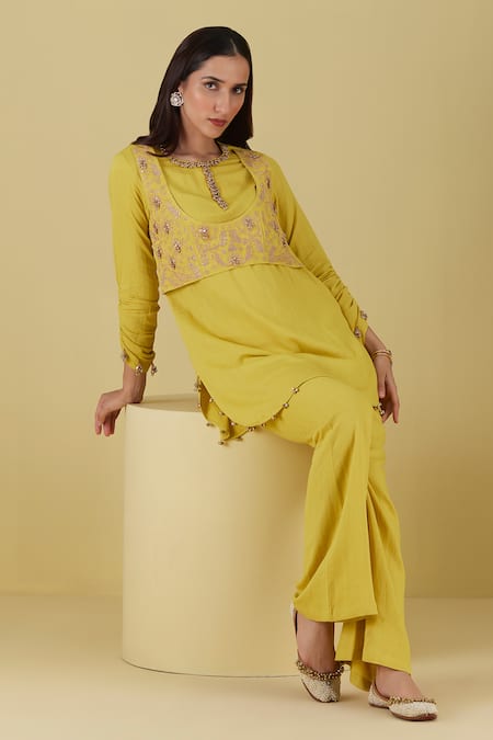 Shop Inej Yellow Rayon Bows Round Embroidered Mock Waistcoat Tunic With Bell Bottom Pant at Aza Fashions Shop_Inej_Yellow Rayon Bows Round Embroidered Mock Waistcoat Tunic With Bell Bottom Pant _at_Aza_Fashions