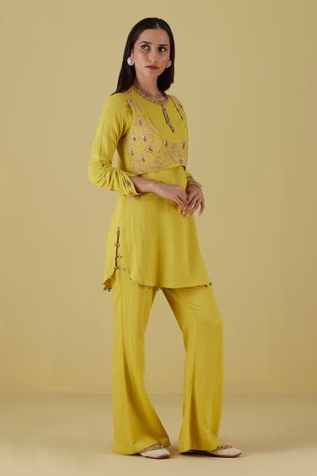 Buy Inej Yellow Rayon Bows Round Embroidered Mock Waistcoat Tunic With Bell Bottom Pant Online at Aza Fashions Buy_Inej_Yellow Rayon Bows Round Embroidered Mock Waistcoat Tunic With Bell Bottom Pant _Online_at_Aza_Fashions