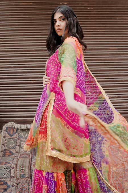 Shop Gulabo Jaipur Pink Chiffon Beads, Zari, Gota Patti Qala Bandhani Pattern Kurta Sharara Set at Aza Fashions Shop_Gulabo Jaipur_Pink Chiffon Beads, Zari, Gota Patti Qala Bandhani Pattern Kurta Sharara Set _at_Aza_Fashions