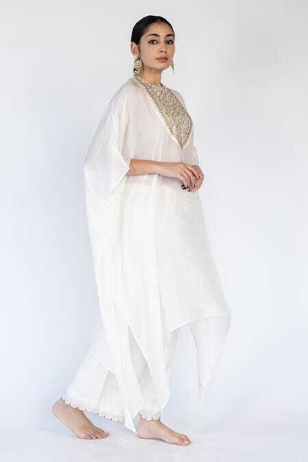 Shop_Nirjara_Ivory Cotton, Silk Sequins Round Neck Placed Floral Embroidered Kaftan With Pant _Online_at_Aza_Fashions