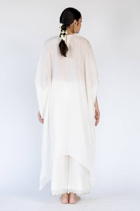 Nirjara_Ivory Cotton, Silk Sequins Round Neck Placed Floral Embroidered Kaftan With Pant _at_Aza_Fashions
