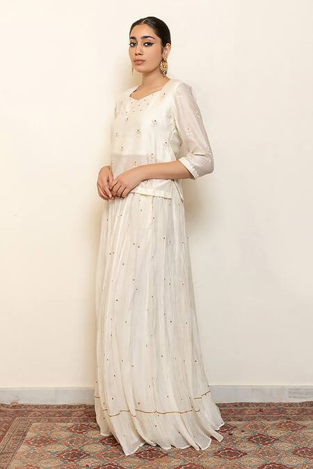 Buy Nirjara Ivory Chanderi Cotton, Heer Floral Motifs Kanchadi Blouse And Lehenga Set Online at Aza Fashions Buy_Nirjara_Ivory Chanderi Cotton, Heer Floral Motifs Kanchadi Blouse And Lehenga Set _Online_at_Aza_Fashions