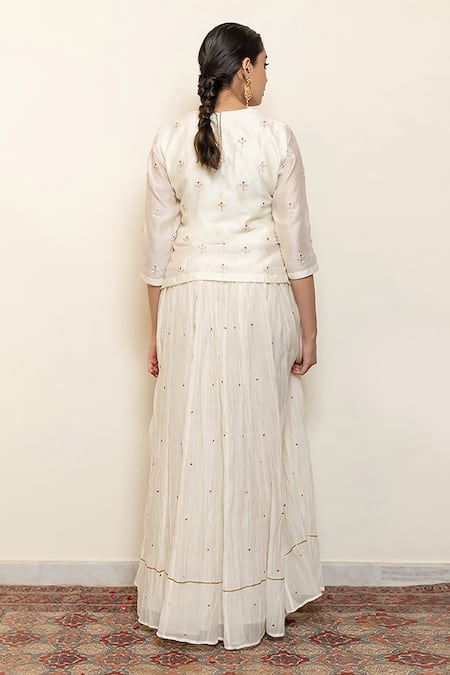 Shop Nirjara Ivory Chanderi Cotton, Heer Floral Motifs Kanchadi Blouse And Lehenga Set Online at Aza Fashions Shop_Nirjara_Ivory Chanderi Cotton, Heer Floral Motifs Kanchadi Blouse And Lehenga Set _Online_at_Aza_Fashions