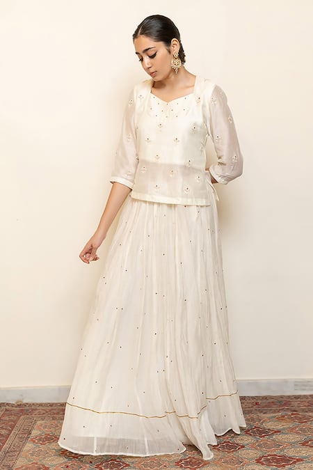 Nirjara Ivory Chanderi Cotton, Heer Floral Motifs Kanchadi Blouse And Lehenga Set at Aza Fashions Nirjara_Ivory Chanderi Cotton, Heer Floral Motifs Kanchadi Blouse And Lehenga Set _at_Aza_Fashions