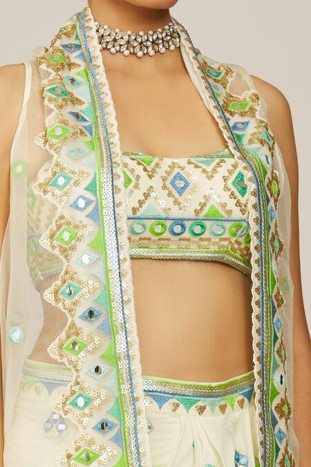 Gopi Vaid Ivory Georgette, Crepe Embroidery, Tassels Round Harita Cape Draped Skirt Set at Aza Fashions Gopi Vaid_Ivory Georgette, Crepe Embroidery, Tassels Round Harita Cape Draped Skirt Set _at_Aza_Fashions