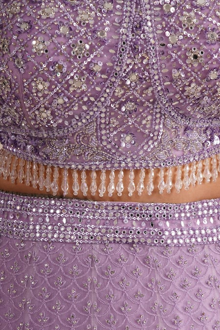 Chaashni By Maansi And Ketan_Purple Net Beads, Feathers Sweetheart Neck Embroidered Blouse Lehenga Set _at_Aza_Fashions