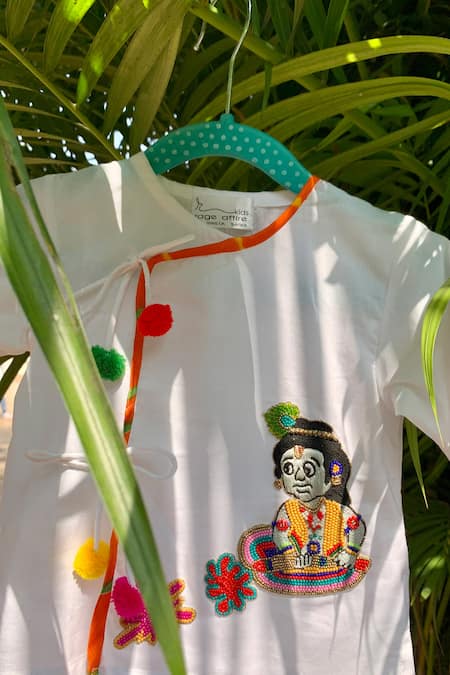 Shop Rage Attire-Sweta Saria White Cotton Pom-poms Rang De Krishna Embroidered Kurta With Dhoti at Aza Fashions Shop_Rage Attire-Sweta Saria_White Cotton Pom-poms Rang De Krishna Embroidered Kurta With Dhoti _at_Aza_Fashions